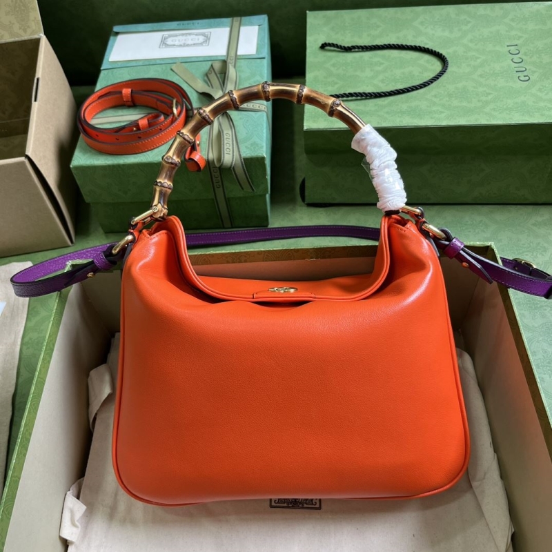 G*u*i top handle bags